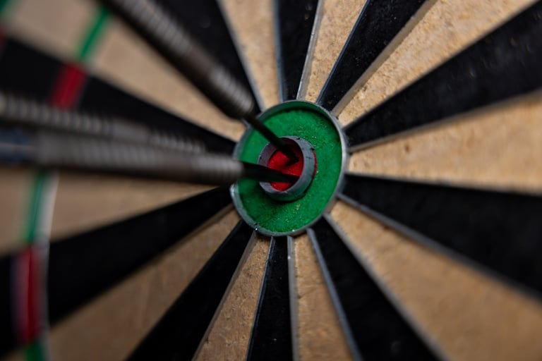 Darts arrows in the target centre