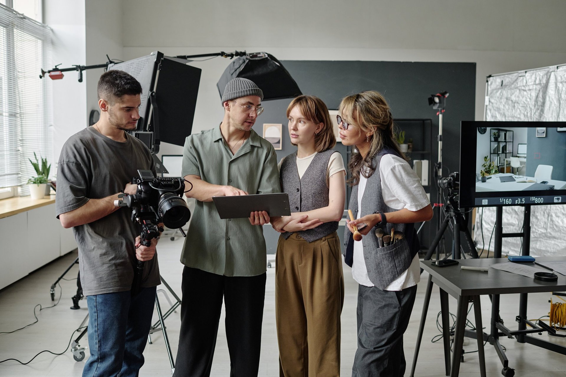 Director discussing a shooting day with cameraman on a film set