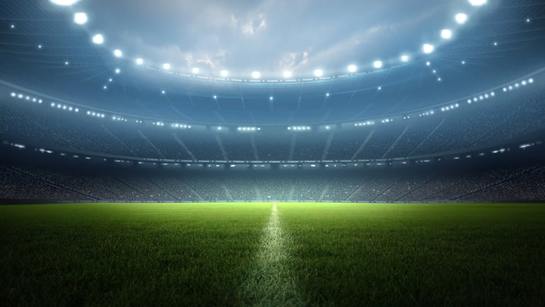 Stadium interior under floodlights
